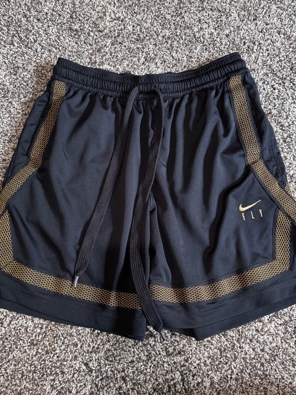Nike Women's Black Athletic Shorts with Gold Trim